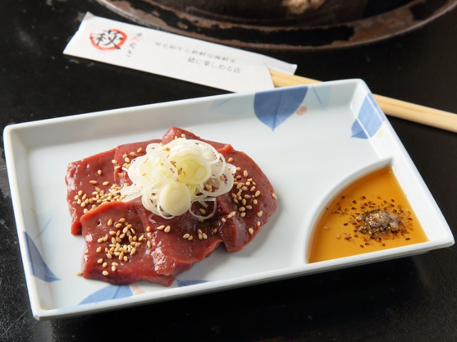 Savor charcoal-grilled barbeque and fresh seafood in the relaxing setting of a private room