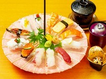 Sushi Aounabara_Miyabi - is a truly eye-pleasing combination of sushi. Sushi is beautifully arranged on an opened Japanese umbrella.